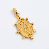 Oval, organically finished charm featuring the figure of a woman. Handmade with classic detailing and a decorative gold beaded border, displayed on a white background.
