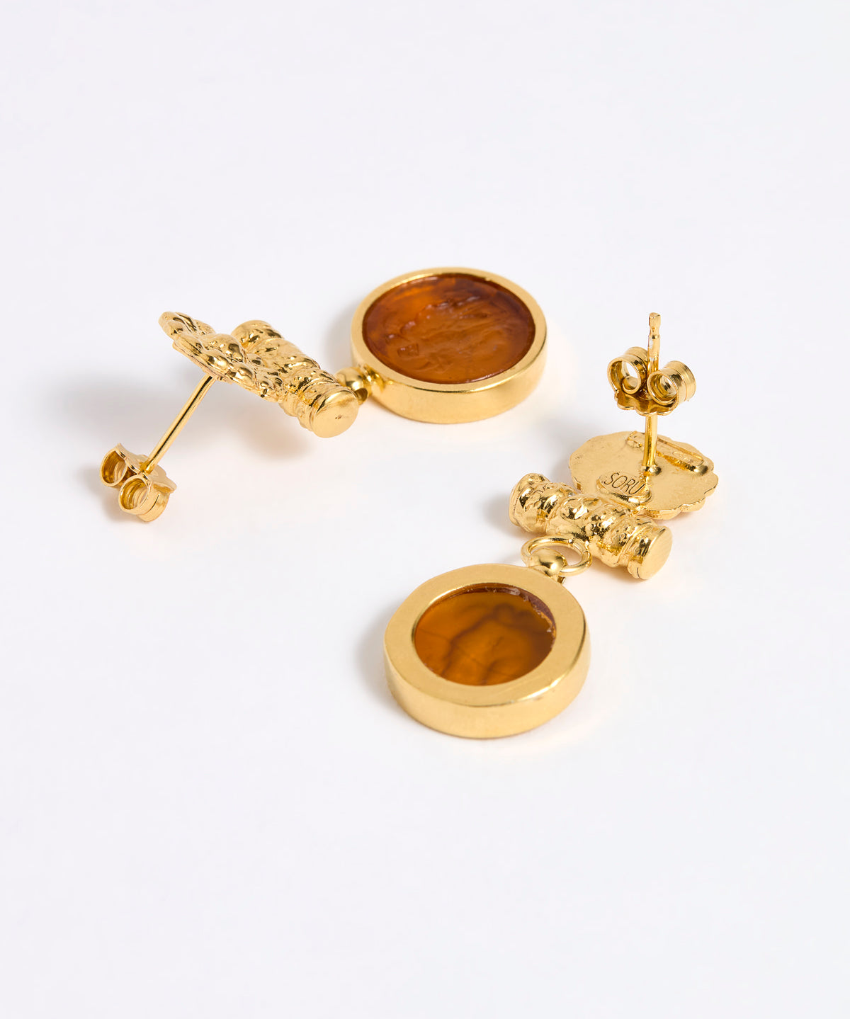 Reverse image of Gold plated  drop earrings with round amber glass pendant featuring an image of twins.