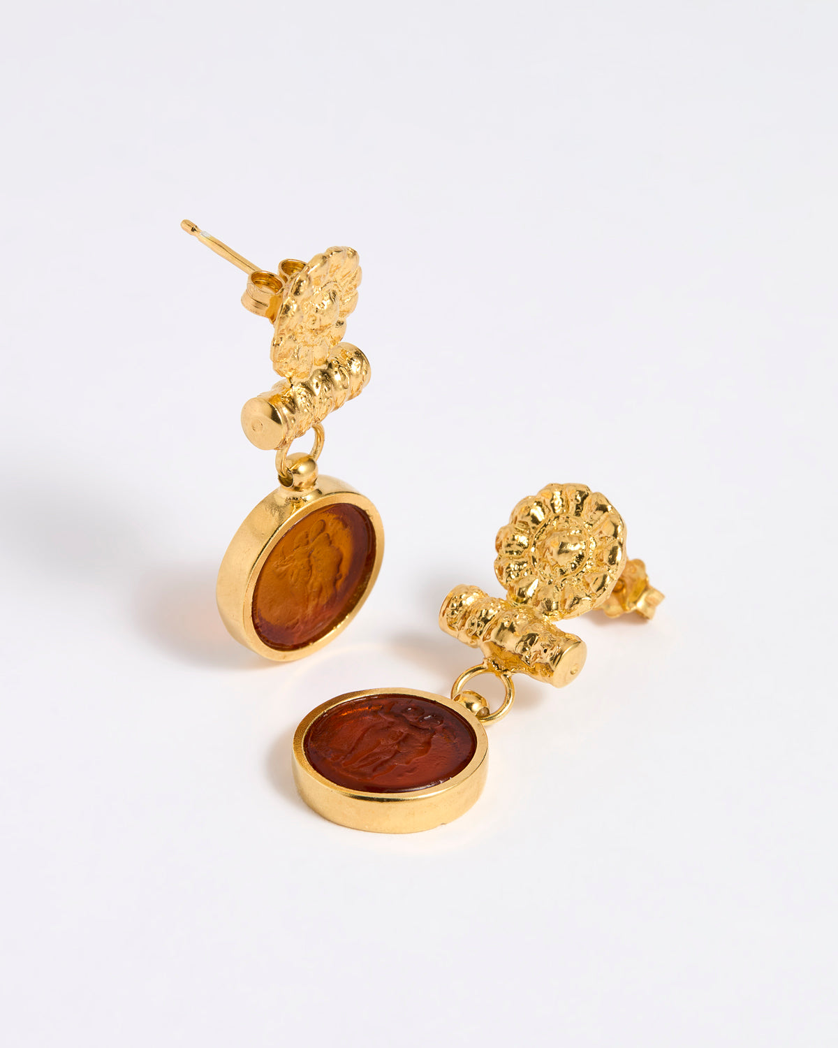 Gold plated  drop earrings with round topaz glass pendant featuring an image of twins.