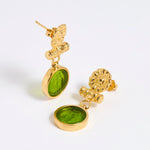 Gold plated drop earrings with round Verde glass pendant featuring an image of twins.
