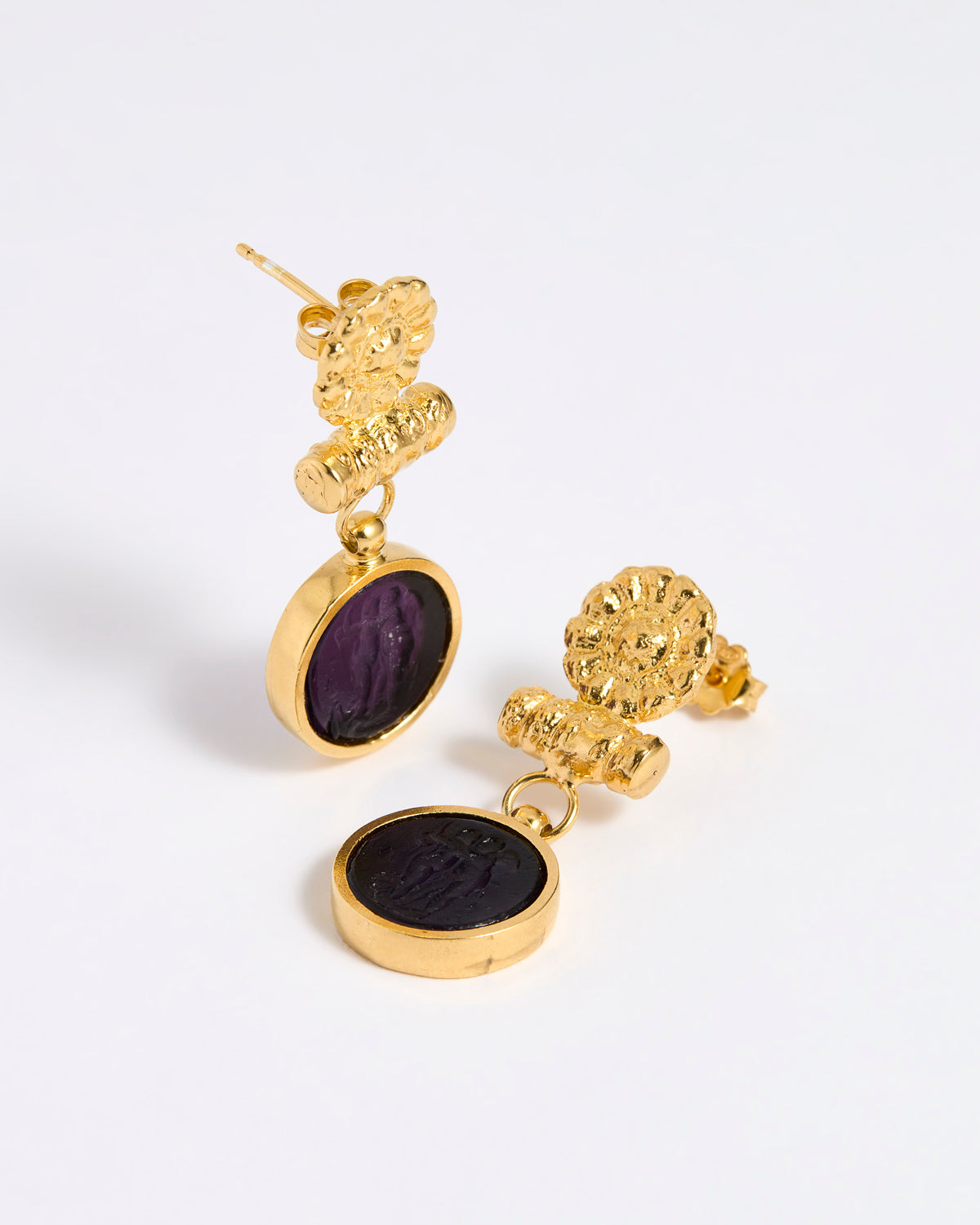 Gold plated  drop earrings with round violet glass pendant featuring an image of twins.