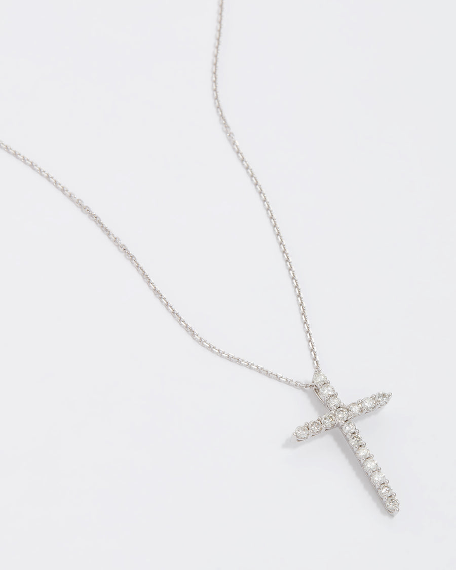product shot of 18ct white gold and diamond cross pendant