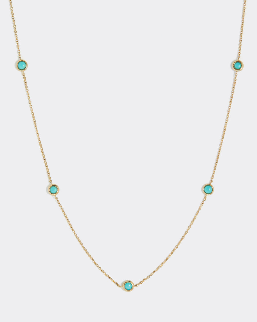 Soru Jewellery turquoise station and gold necklace product shot 