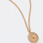 soru jewellery gold vermeil heart and swarivski crystal double sided pendant, close up product shot.