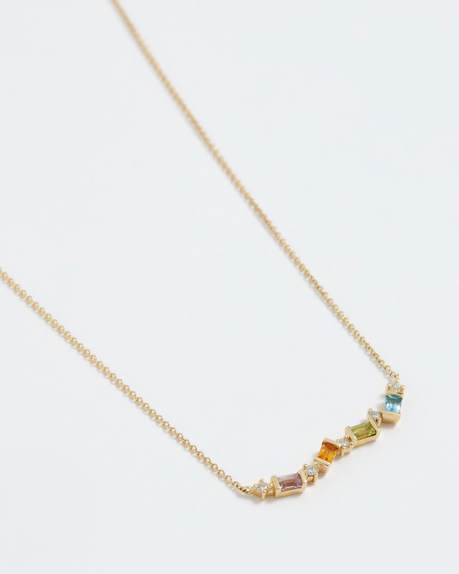 Soru Jewellery multi coloured baguette citrine and topaz and diamond bar necklace product shot lay down close up 