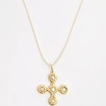 back of pearl and gold gemstone pendant cross necklace on cord