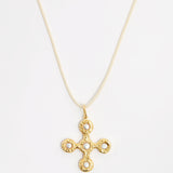 back of pearl and gold gemstone pendant cross necklace on cord