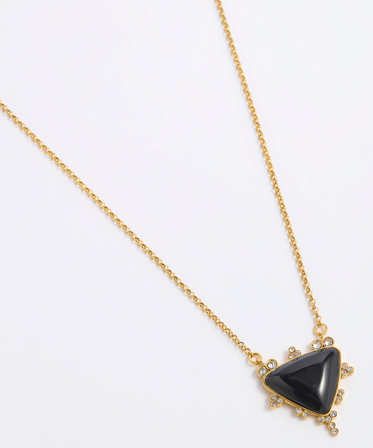 A gold chain necklace featuring a triangular black onyx pendant with small clear crystal accents in a gold setting, displayed on a white background.