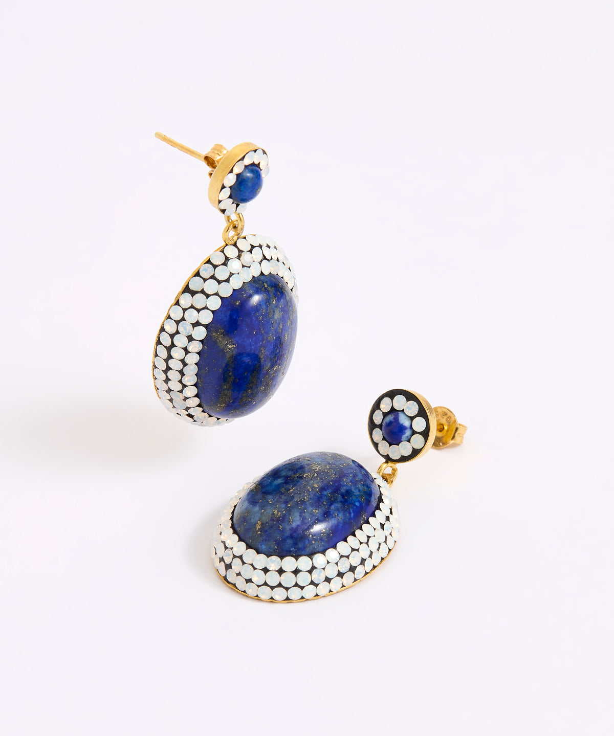 A pair of gold-toned drop earrings featuring large oval lapis lazuli stones surrounded by rows of small opal stones, with smaller matching stud earrings above, photographed on a white background.
