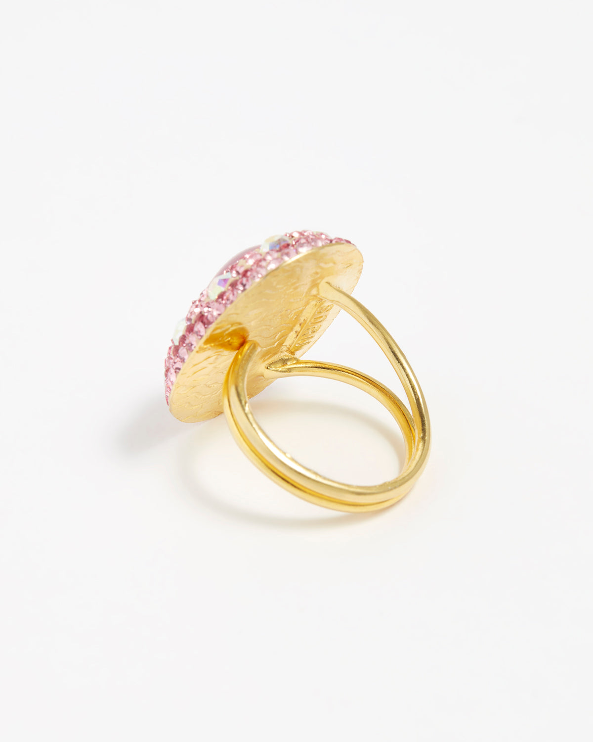 Close up reverse product shot of adjustable ring showing the gold band on a white background