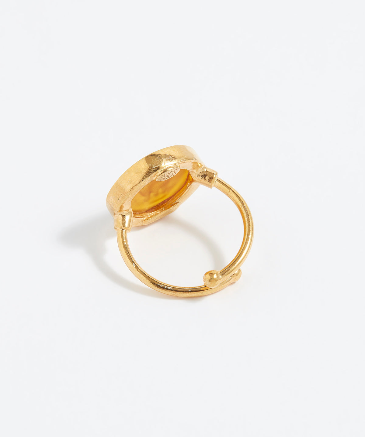 Gold ring on a white background