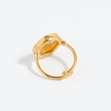 Gold ring on a white background