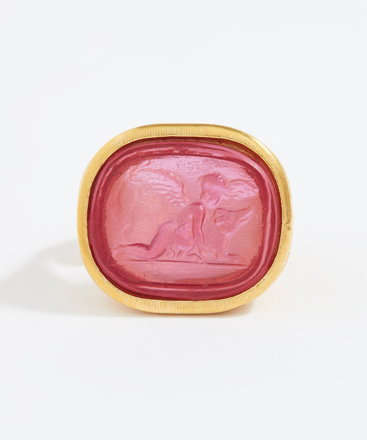 Pink stone with gold frame on a white background