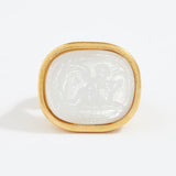 Decorative stone with gold frame on a white background
