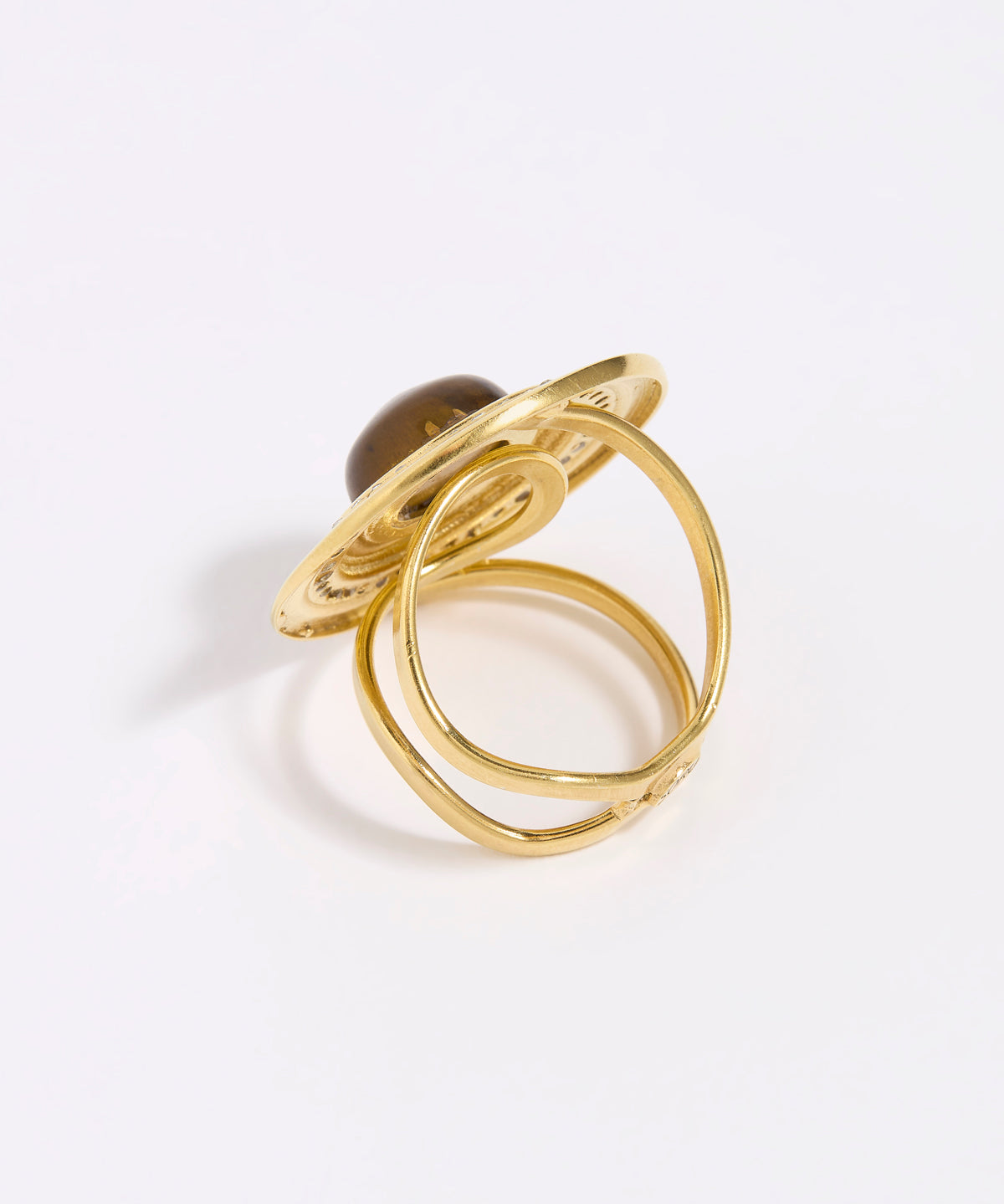 Gold ring with a white background