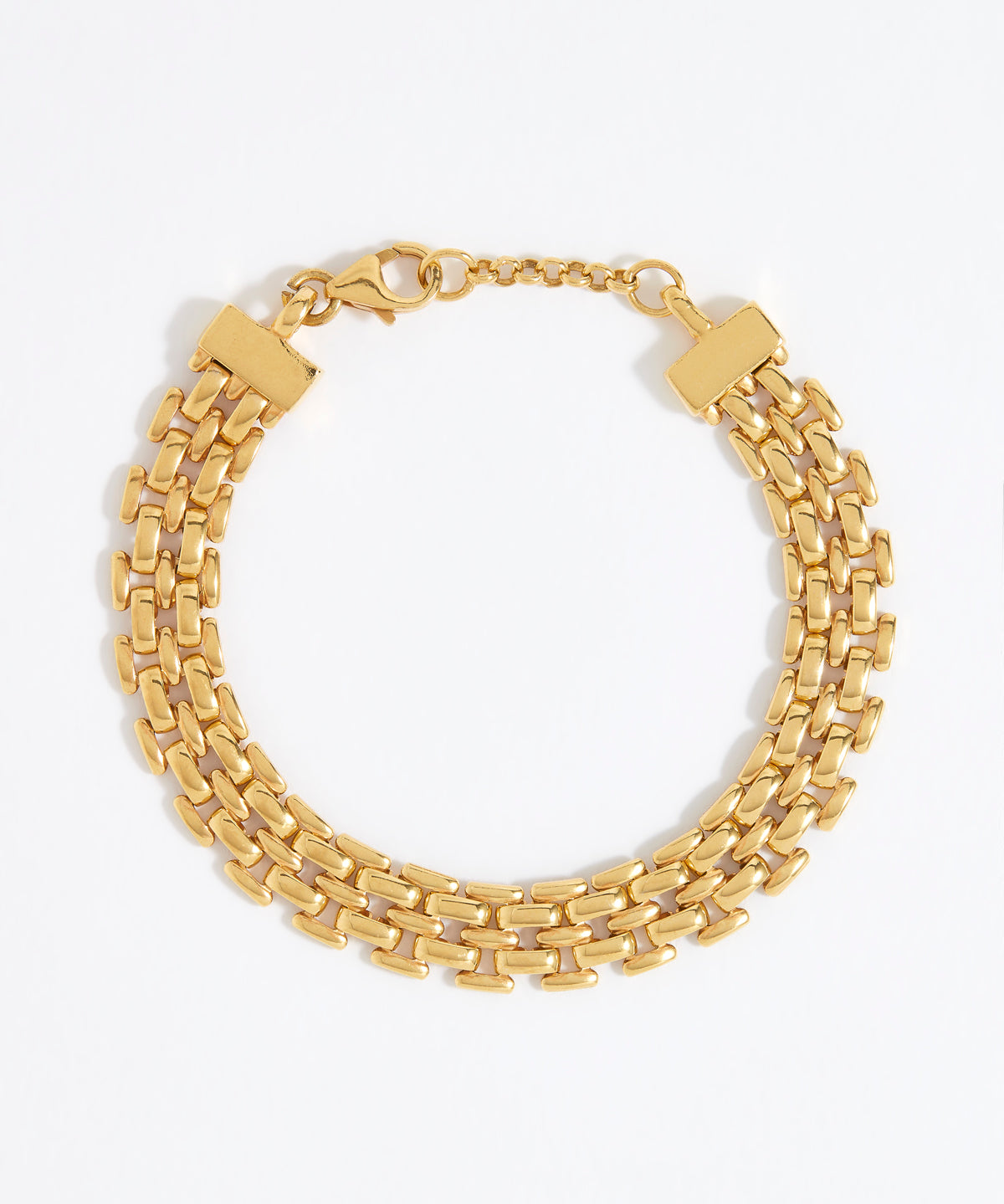 Gold chain bracelet on a white background