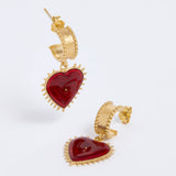 Gold hoop earrings with red heart drop with evil eye