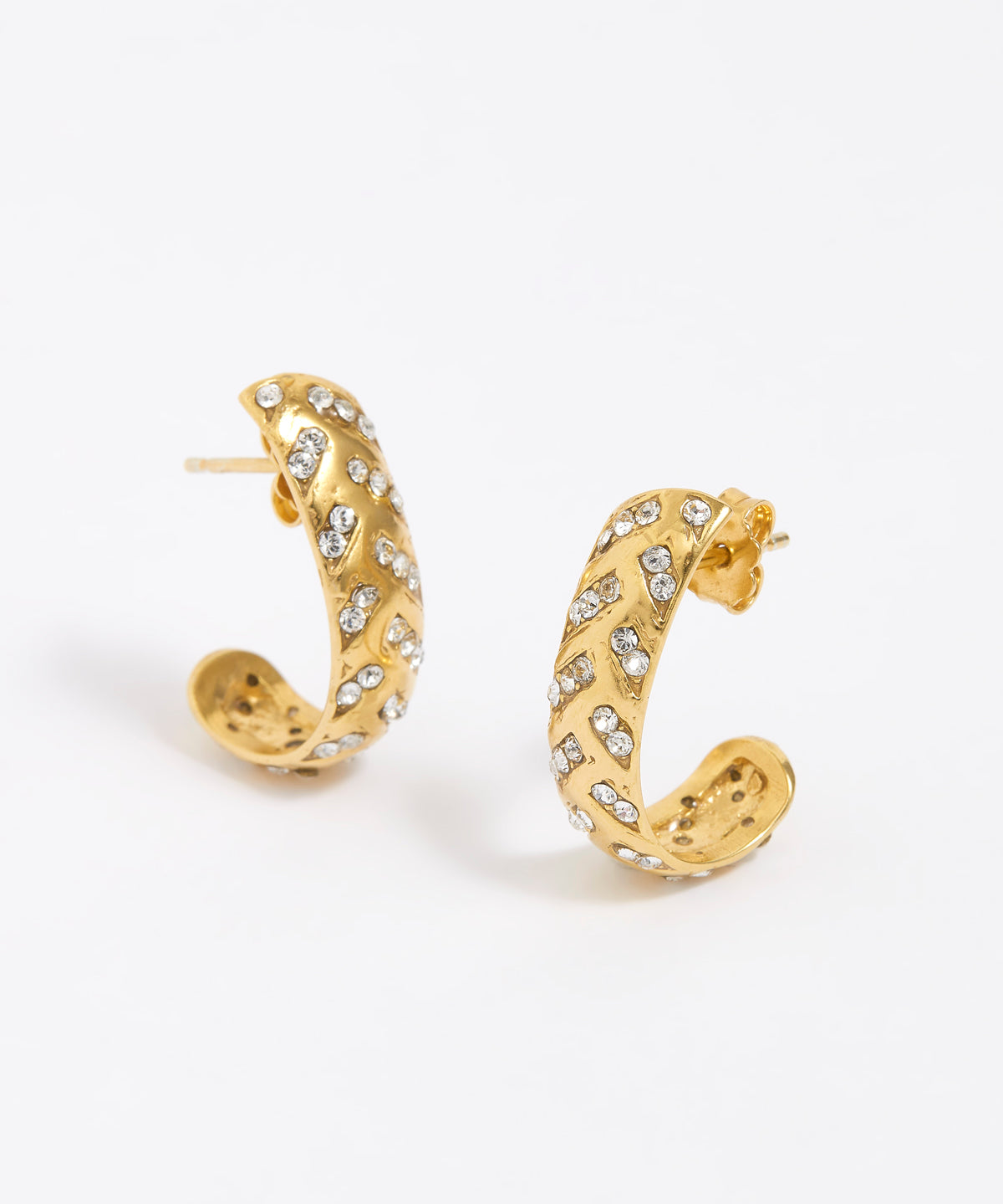 Gold hoop earrings with embedded stones on a white background