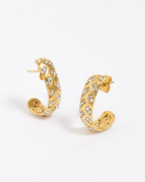 Gold hoop earrings with embedded stones on a white background