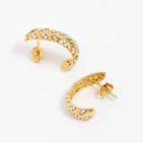 Gold hoop earrings with clear gemstones on a white background