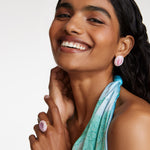 18kt gold plated stud earring with pink cats eye gem surrounded by crystals 