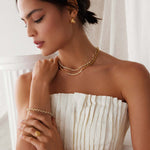 gold plated silver small hoops with fan, textured detailing