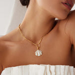 gold plated silver small hoops with fan, textured detailing