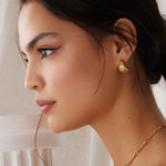 gold plated silver small hoops with fan, textured detailing
