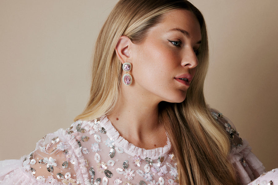 close up model image wearing the pink double drop earrings 