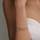 geometric shaped gold and diamond bangle, model shot