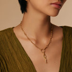 on the model shot of yellow gold plated snake charm