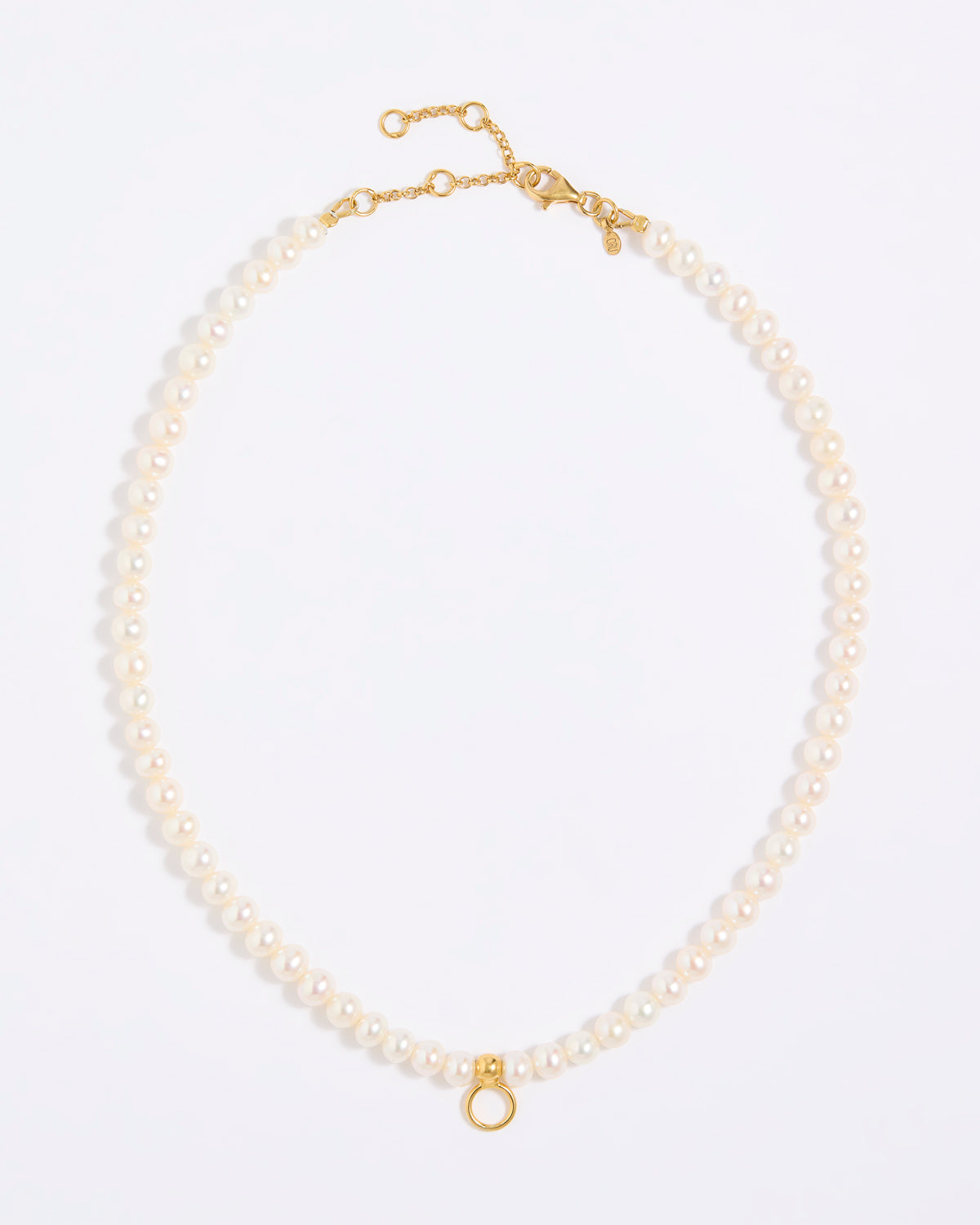 Pearl necklace with gold clasp on a white background