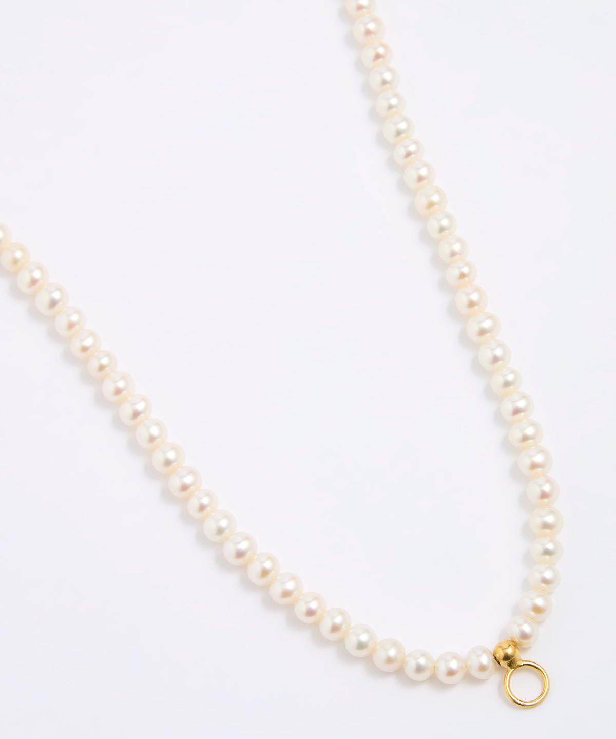 Pearl necklace with a gold clasp on a white background