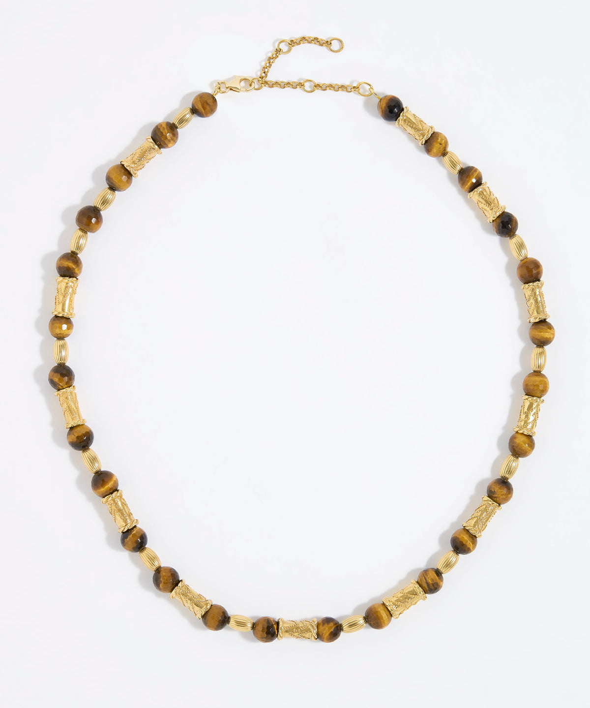 Beaded necklace with gold and tigers eye beads on white background