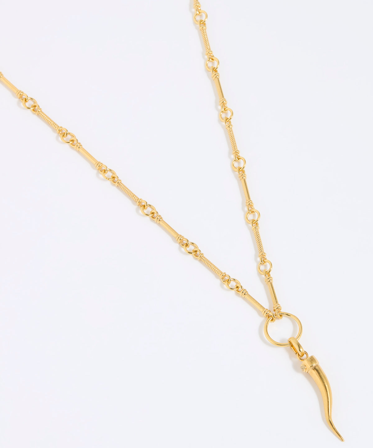 Gold necklace with cornicello charm pendant on a white background