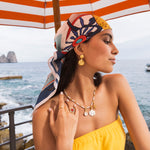 model shot of soru jewellery gold plated silver and enamel shell detachable charm and shell jewellery