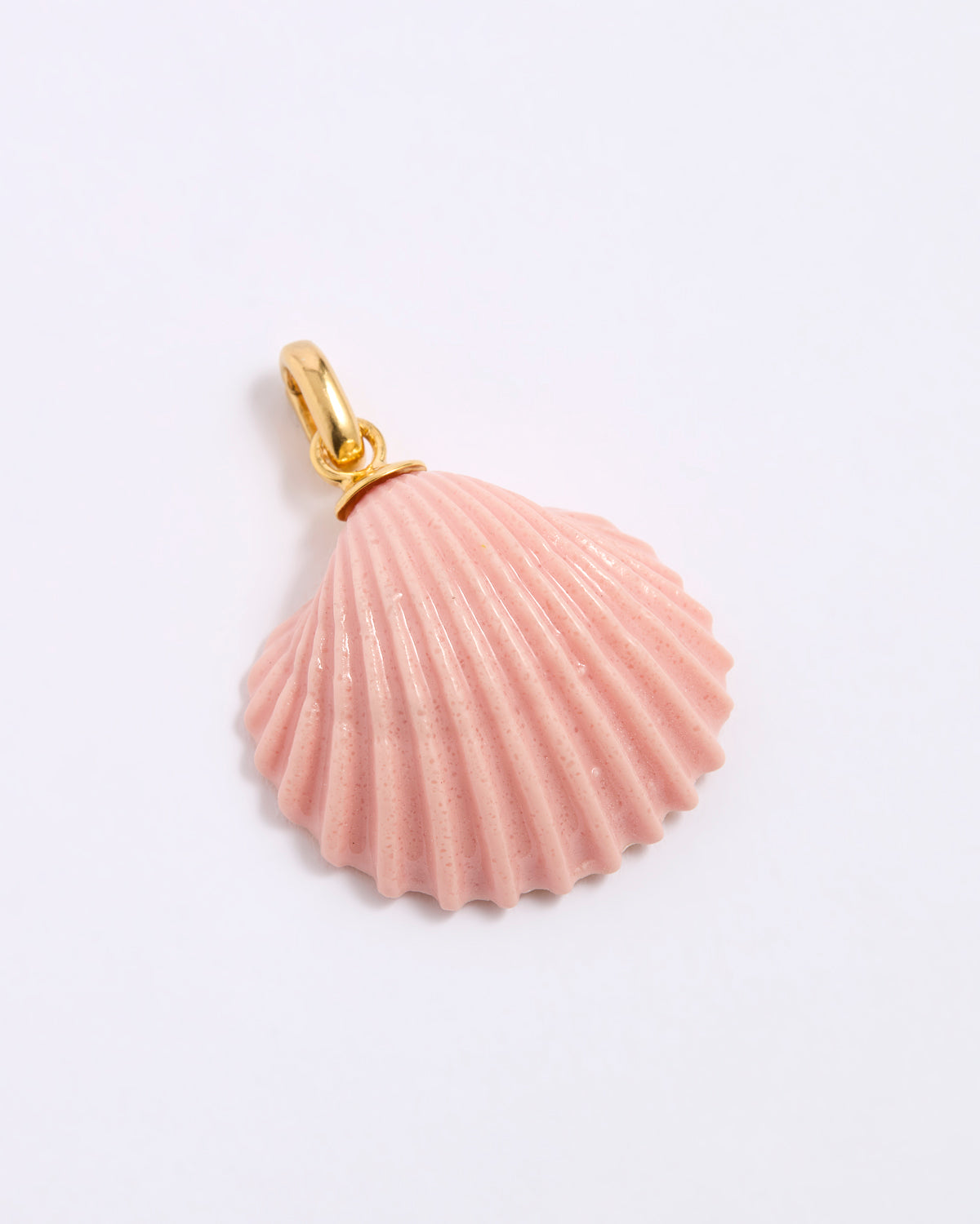 Pink shell pendant with gold coloured clasp on a light gray background