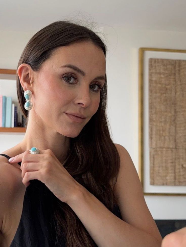 turquoise and silver earrings and rings selfie 