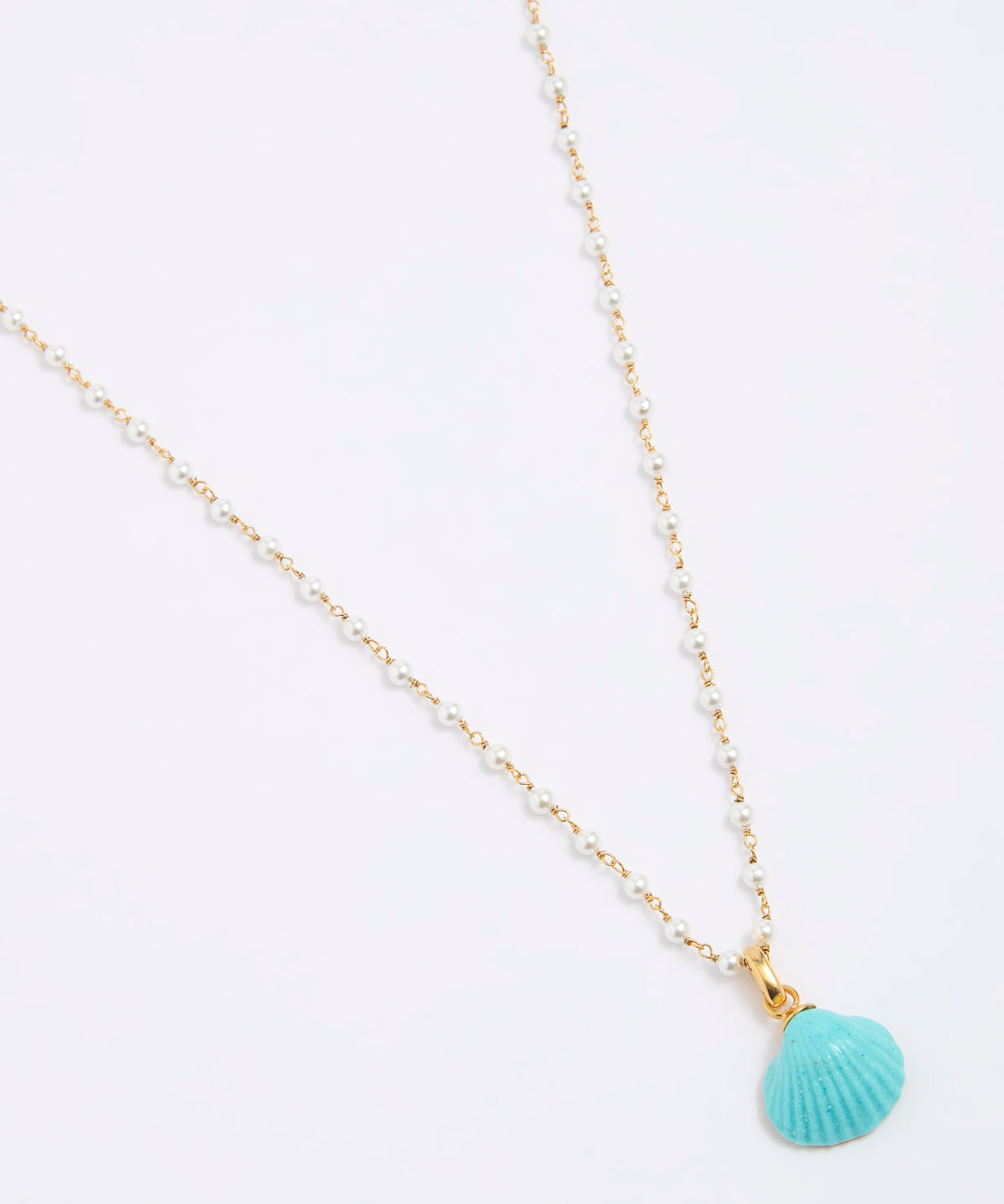 Necklace with a turquoise shell pendant on a white background