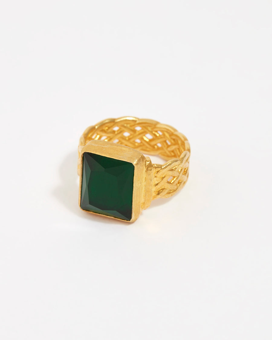 product shot of yellow gold plated ring with large green rectangular crystal