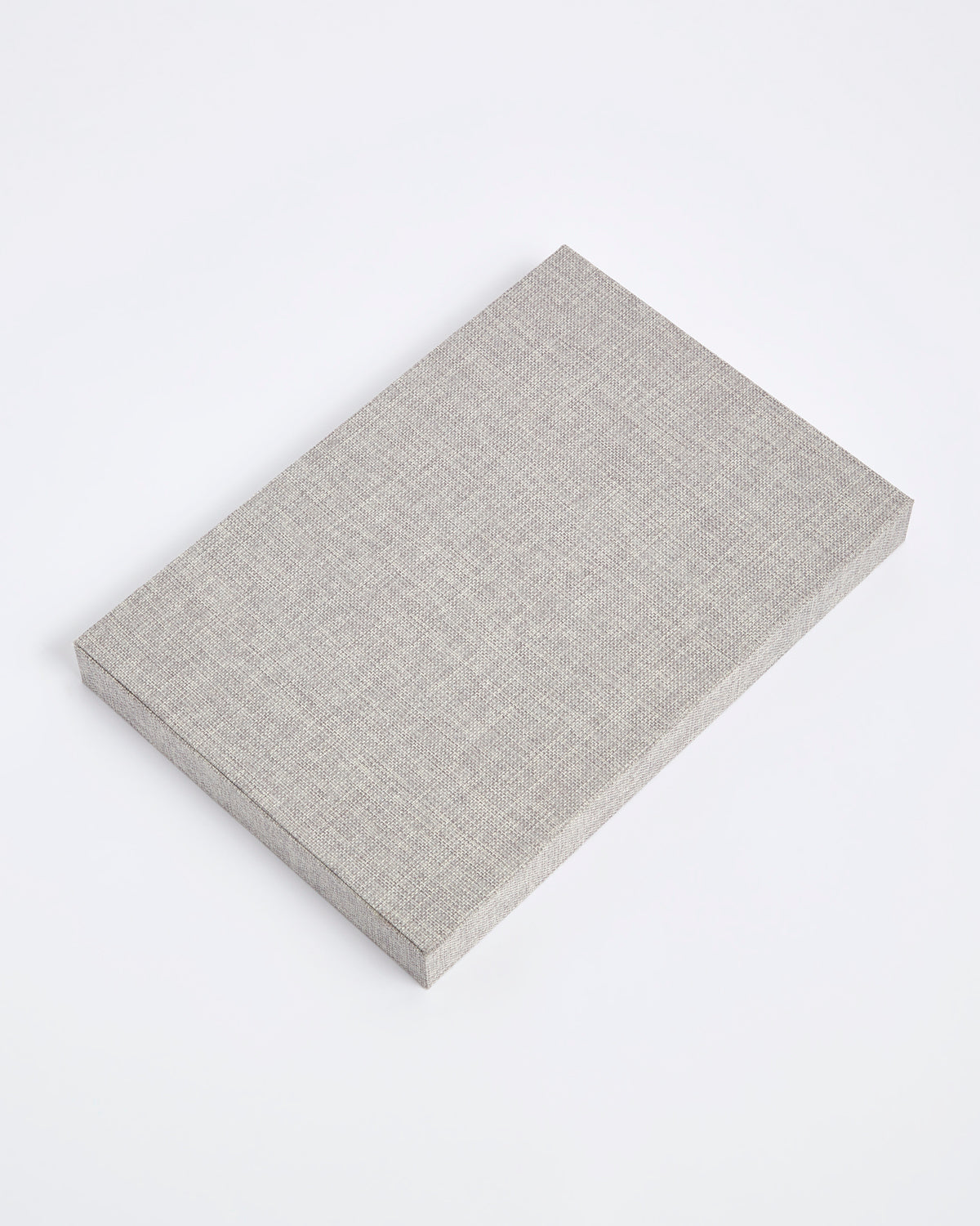 The reverse of the woven linen Kinship Press X Soru Treasures Jewellery Tray