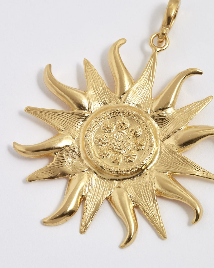 Soru Jewellery large sun charm in gold plated silver 