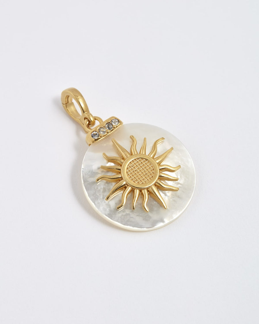 soru jewellery mother of pearl circular clip on charm with sun overlay made from gold plated silver