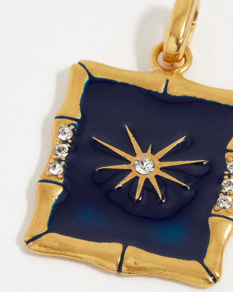 soru rectangular dark blue enamel interchangeable charm for a necklace with a starburst and clear crystal centre and a bamboo shaped boarder, made from gold plates silver