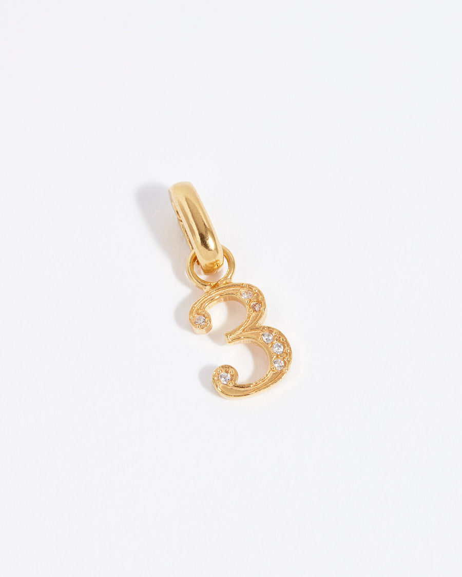 number 3 gold and crystal charm 