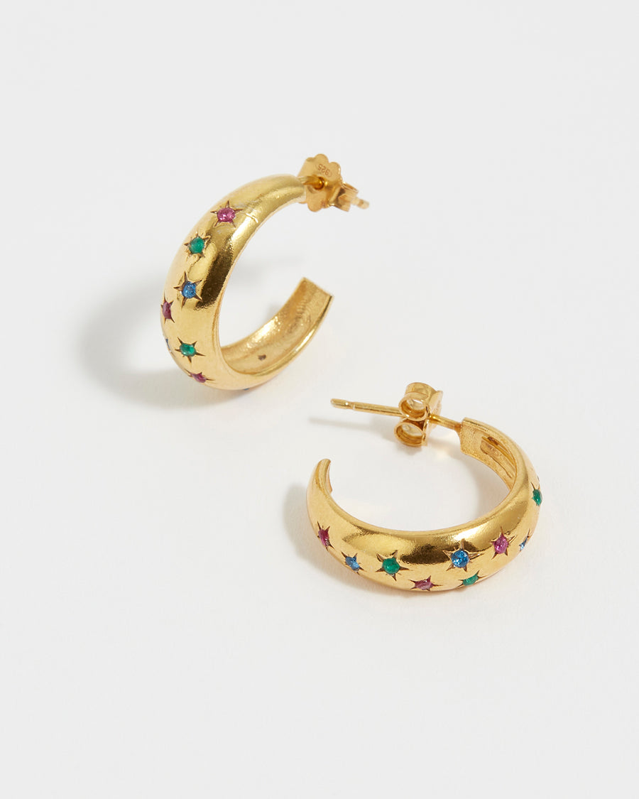 soru small gold pated silver hoop earring with scatted  multi coloured crystal stars etched into the silver