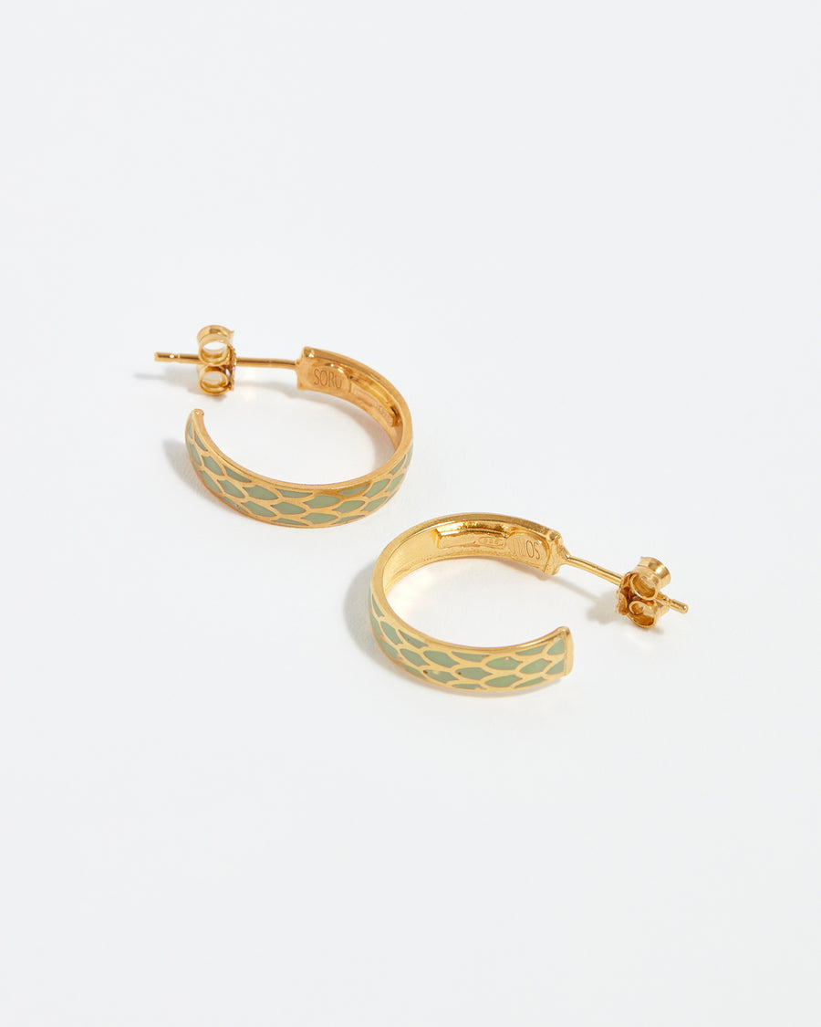 Soru jewellery, gold hoop earrings with pastel green enamel detail