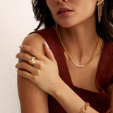 Soru Jewellery model shot showing the gold etched heart ring from further away