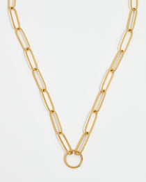 A gold-plated silver chain necklace with a round central hoop and textured interlinking chains.